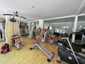 a gym with a bunch of treadmills and machines at Altos del Golf - Fito in Punta del Este