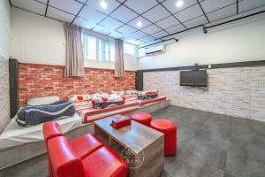 Televisyen dan/atau pusat hiburan di 羅東夜市 工業Loft旅宿
