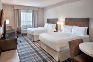 Postel nebo postele na pokoji v ubytování Fairfield Inn & Suites by Marriott Airdrie