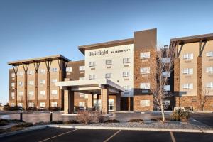 a rendering of a building with a parking lot at Fairfield Inn & Suites by Marriott Airdrie in Airdrie