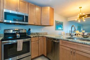 Nhà bếp/bếp nhỏ tại Seaside Beach House 102