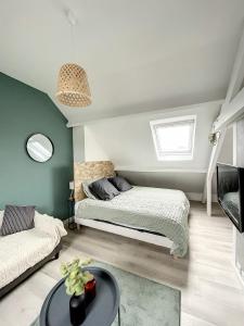 Posteľ alebo postele v izbe v ubytovaní Coeur de ville, T2 cosy & élégant