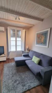 A seating area at Apartment Sant Francesc