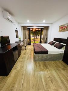 Ένα ή περισσότερα κρεβάτια σε δωμάτιο στο Bunty Residence Ambalangoda