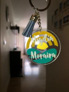 een sleutelhanger met een marmieten bord erop bij Apartamento Migdia-Moraira in Moraira