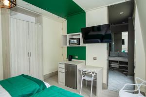 TV a/nebo společenská místnost v ubytování Casa Esmeralda + 30 fotografií