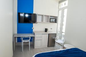 Kuchyň nebo kuchyňský kout v ubytování Casa Esmeralda