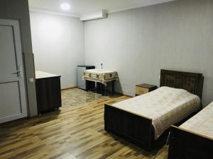 Voodi või voodid majutusasutuse Ruslan Hotel 1 toas