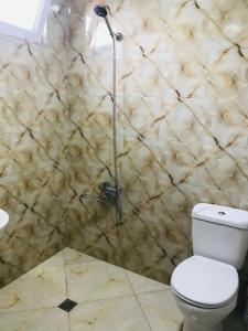 Koupelna v ubytování Ruslan Hotel 1