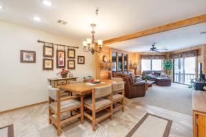 a dining room and living room with a table and chairs at Seven Springs Stoneridge 3 Bedroom Standard Condo, Private Deck condo in Champion