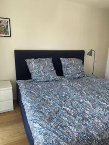 Postel nebo postele na pokoji v ubytování Wunderschönes 4 Zimmer Apartment mit Seeblick + 8 fotografií