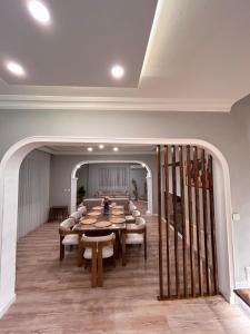 a dining room with a table and chairs at Villa Five Star in Sapanca