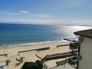 a view of the beach from a building at Garden of Eden - Studio in Sveti Vlas