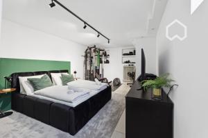 Postel nebo postele na pokoji v ubytování FamilienParadis Pool Garten Grill Parkplatz Fitness Tischtennis + 22 fotografií