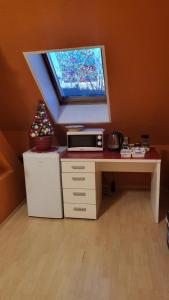 TV a/nebo společenská místnost v ubytování Gasthaus Pavillon