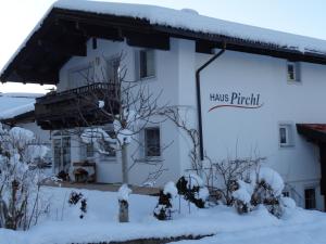 a white building with a sign that reads thanks fireball at Haus Pirchl in Westendorf