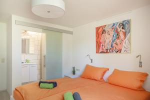 Ένα ή περισσότερα κρεβάτια σε δωμάτιο στο Lakeside Apartment - Seeufer Apartment