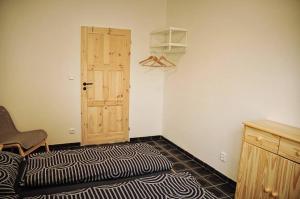 Postel nebo postele na pokoji v ubytování U božích muk