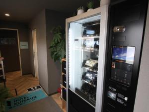 a refrigerator is shown with its door open at HOTEL KUTEKUN - Vacation STAY 31431v in Naka-shibetsu