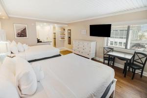 Ένα ή περισσότερα κρεβάτια σε δωμάτιο στο Quintessential Beach Retreat 2nd Flr