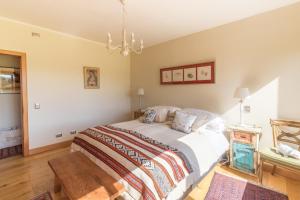 Postel nebo postele na pokoji v ubytování B&B Puerto Varas Playa Venado