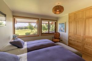 Postel nebo postele na pokoji v ubytování B&B Puerto Varas Playa Venado