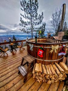 a wooden deck with a pirate ship on it at Planinska kuća MESECEV PUT in Bajina Bašta