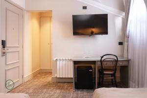 Sjónvarps- og/eða afþreyingartæki á Hotel José Nogueira