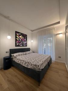 Säng eller sängar i ett rum på Scarlatti 67 Apartment