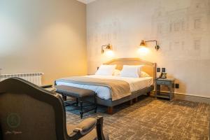 Rúm í herbergi á Hotel José Nogueira