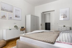 Postel nebo postele na pokoji v ubytování Stay2gether City Buzz Apt - O2 arena - Sleeps 6