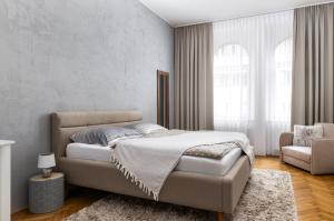 Postel nebo postele na pokoji v ubytování Stay2gether City Buzz Apt - O2 arena - Sleeps 6