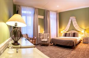 Rúm í herbergi á Hotel José Nogueira