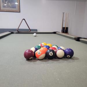 a group of billiard balls on a pool table at Sunsets by the Water in Cape Coral