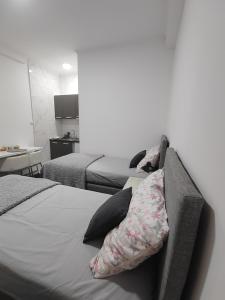 Voodi või voodid majutusasutuse Apartman Centar Ivanjica toas