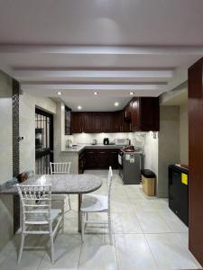 Virtuvė arba virtuvėlė apgyvendinimo įstaigoje Comodo Apartamento, Norte de Quito