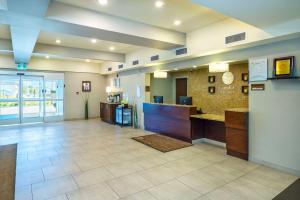 a lobby of a hotel with a reception desk at Comfort Inn & Suites in Terrace