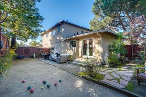 a house with a lot of balls in the yard at Seascape Aptos Retreat with Bocce Ball Court! in Aptos