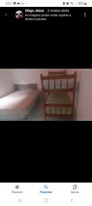 ein Bild eines Bettes in einem Zimmer in der Unterkunft Recanto Simões in Itariri