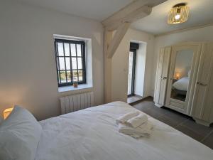 Ένα ή περισσότερα κρεβάτια σε δωμάτιο στο Gîte Huisseau-sur-Mauves, 5 pièces, 10 personnes - FR-1-590-361