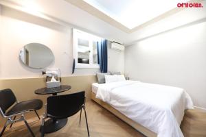 Postel nebo postele na pokoji v ubytování Number 25 Hotel