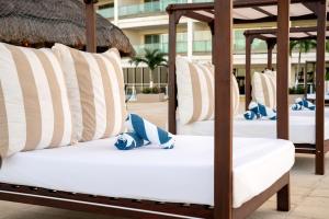 Postel nebo postele na pokoji v ubytování Seadust Cancun Family Resort - All Inclusive