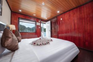 Ein Bett oder Betten in einem Zimmer der Unterkunft Ruby Cruise