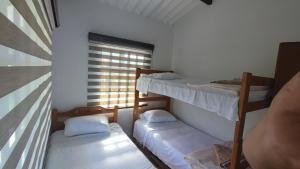 Postel nebo postele na pokoji v ubytování CASA CAMPESTRE LAS MARIAS