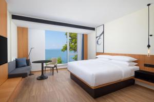 Ein Bett oder Betten in einem Zimmer der Unterkunft Fairfield by Marriott Hangzhou Qiandao Lake