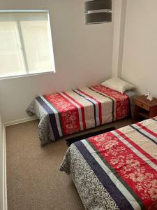 Кровать или кровати в номере Quebrada de la Candelaria III