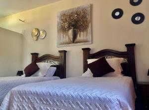 Postel nebo postele na pokoji v ubytování Mayan Plaza B&B Habitación Independiente