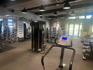 a gym with a treadmill and lots of equipment at Jackal Creek Golf Estate in Roodepoort