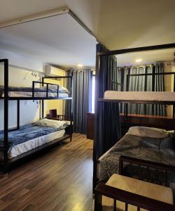 Postel nebo postele na pokoji v ubytování Sapa House Hotel Halal Certified