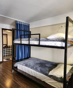Postel nebo postele na pokoji v ubytování Sapa House Hotel Halal Certified